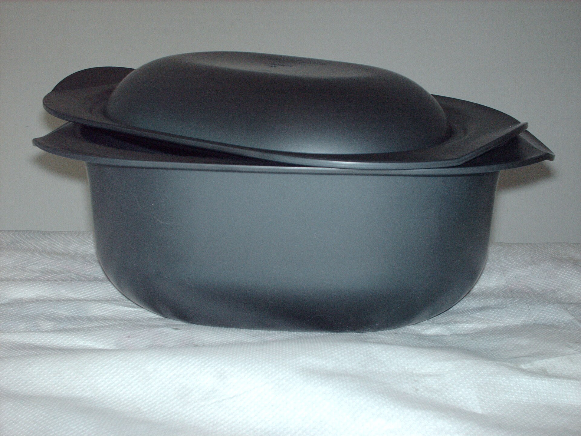 Imagem de referência de Tupperware, descrito nos dados abertos como marca de uma linha de produtos domésticos