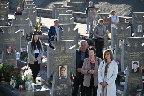 Ukraine commemorates fallen soldiers who died in the war with Russia, on Defenders of Ukraine Day in Lviv on Thursday.