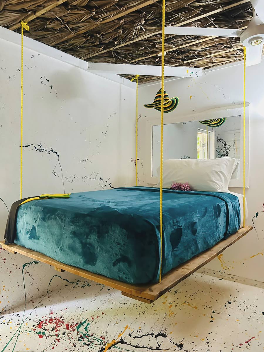 Some bedrooms have hanging beds suspended from the ceiling.